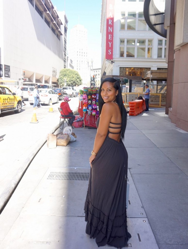 Tanya Major wearing: Free People Extratropical Dress, Hermes Sandals, Gucci Cross Body Bag