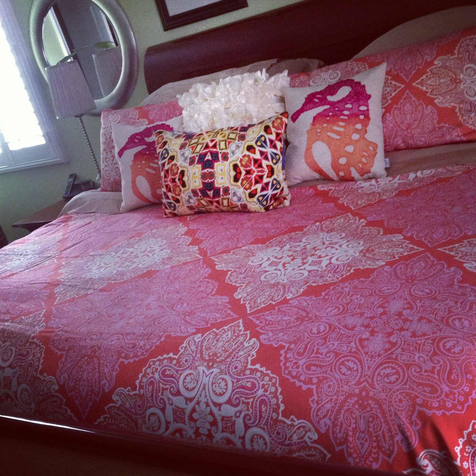 bed with throw pillows