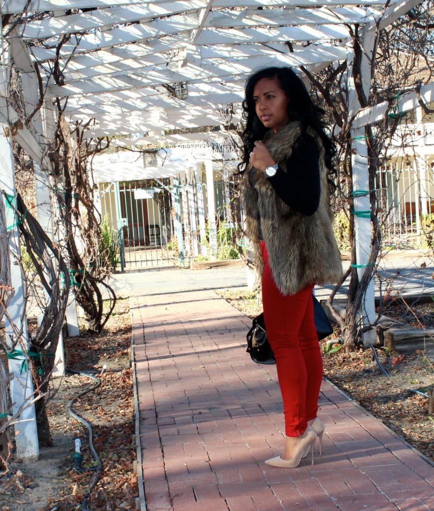 Wearing - fur vest, V-neck sweater, red jeans, Jimmy Choo Pumps, YSL Bag